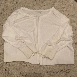 White Tyler Boe cropped sweater.